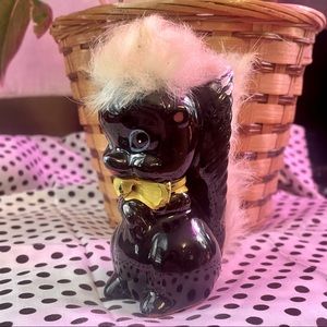 Vintage kitsch anthropomorphic ceramic skunk figurine